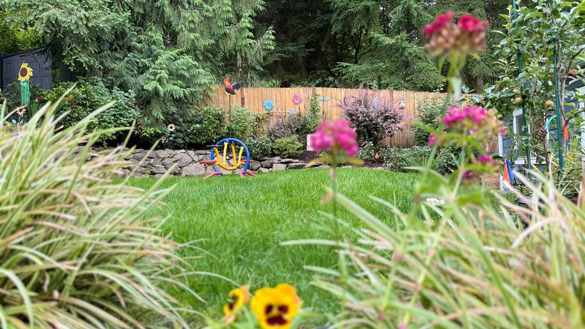 Colorful flowers and landscaping around the guesthouse